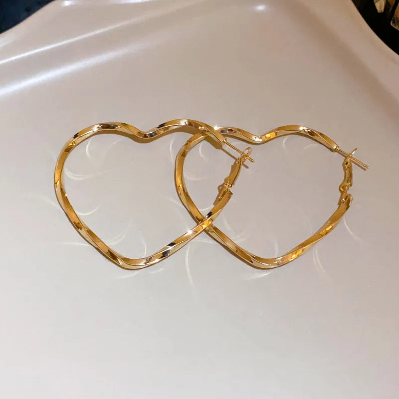 Hallow Golden Heart 18k Gold Plated Earrings. - TheFindify