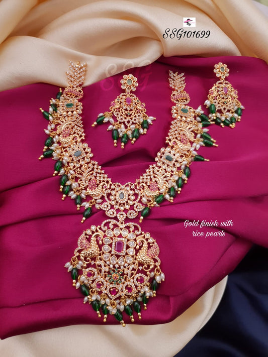Gold Finish Rice Pearl Peacock Haram With Earrings - TheFindify
