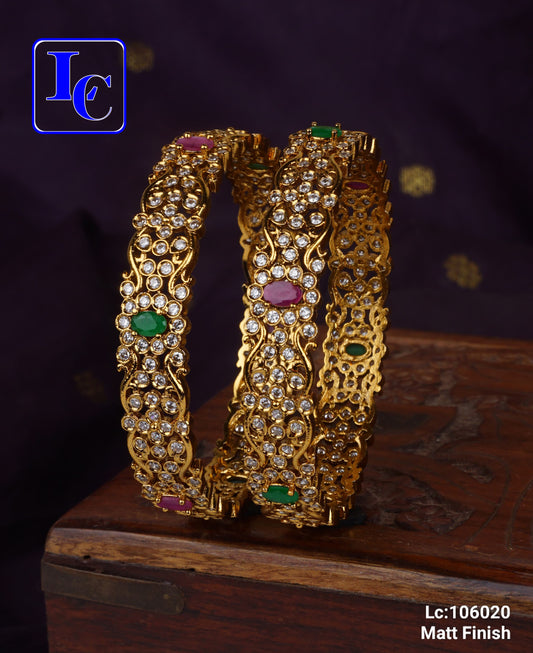 Ivory Gold Radiance Bangles - TheFindify