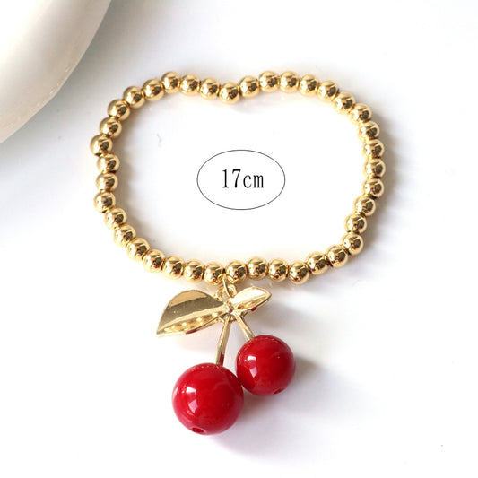 Gold Beaded Bracelet with Cherry Charm